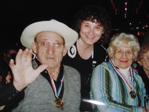 The author (center) with her dad and mom at their 50th wedding anniversary celebration.